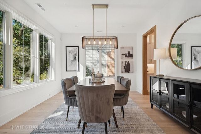 dining area with light wood-type flooring