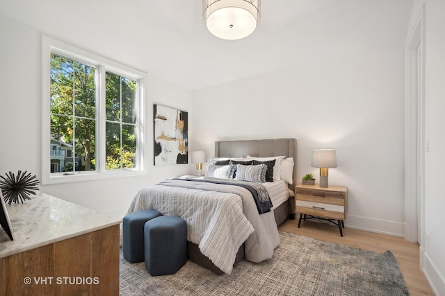 bedroom featuring wood-type flooring