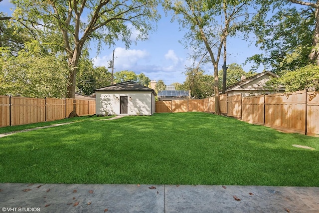 view of yard with a storage unit