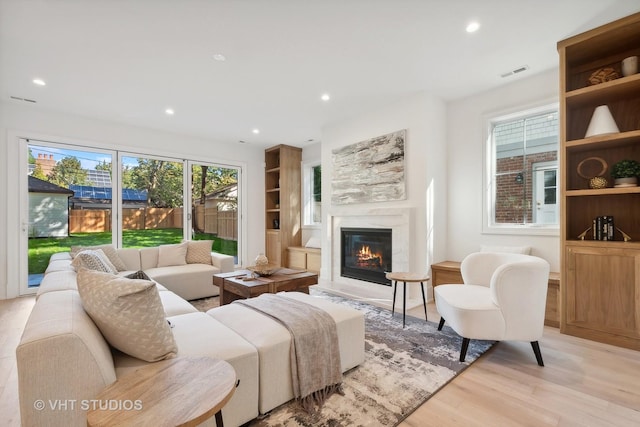 living room with light hardwood / wood-style floors