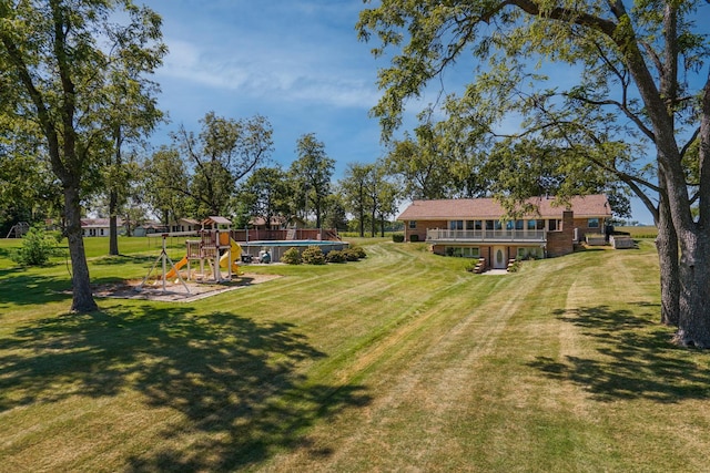 view of yard with a playground