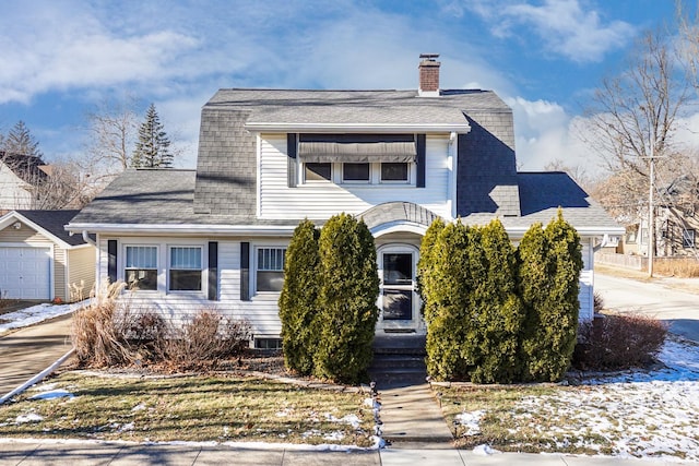 view of front of property with a garage