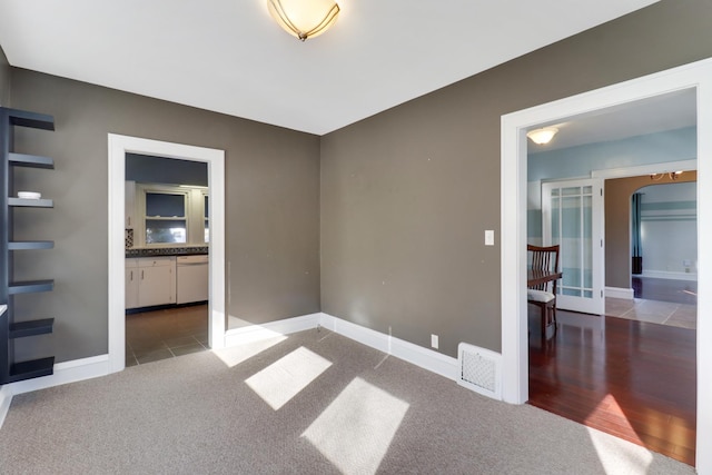 empty room with carpet floors