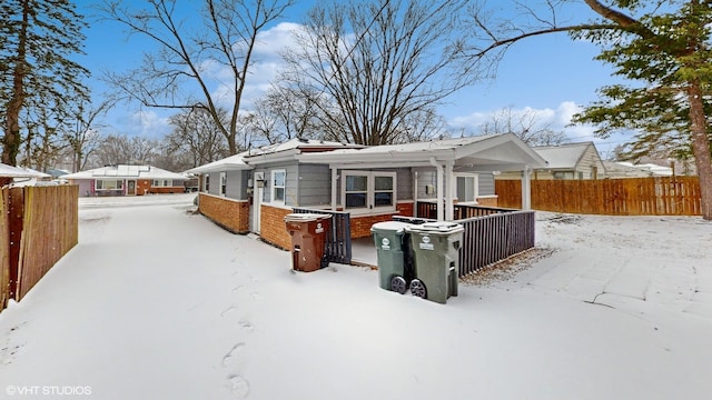 view of snow covered property