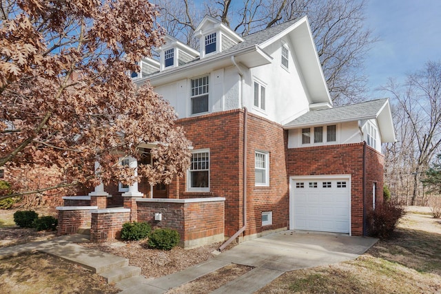 view of side of home featuring a garage