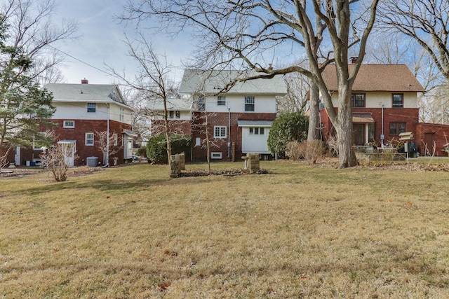 view of yard with central AC unit