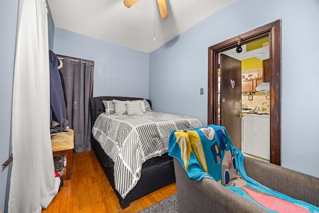 bedroom featuring ceiling fan and wood-type flooring