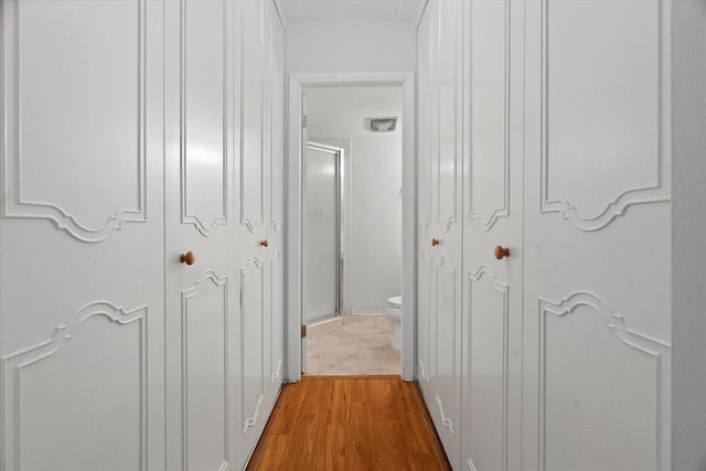 hall featuring hardwood / wood-style flooring