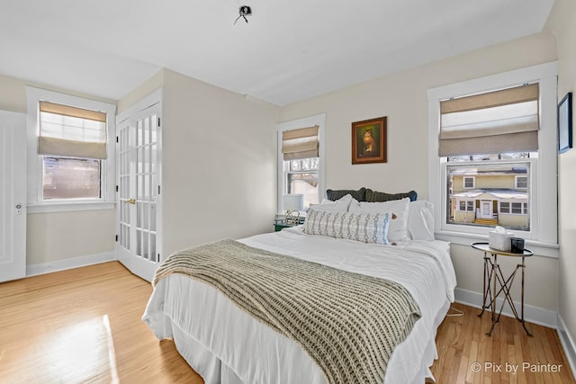 bedroom with wood-type flooring