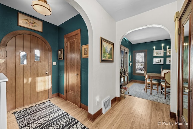 foyer with hardwood / wood-style floors