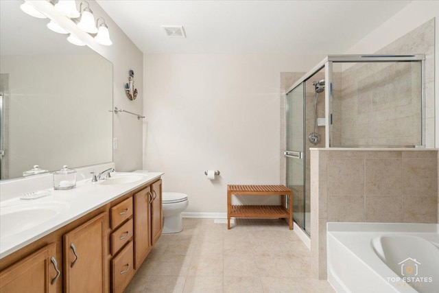 full bathroom featuring toilet, tile patterned floors, separate shower and tub, and vanity