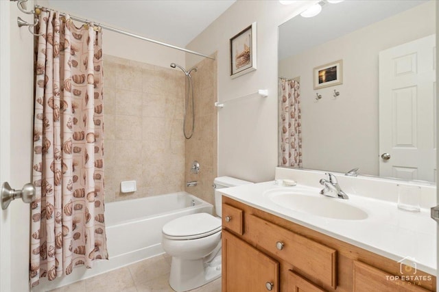 full bathroom featuring toilet, tile patterned flooring, vanity, and shower / bath combo with shower curtain