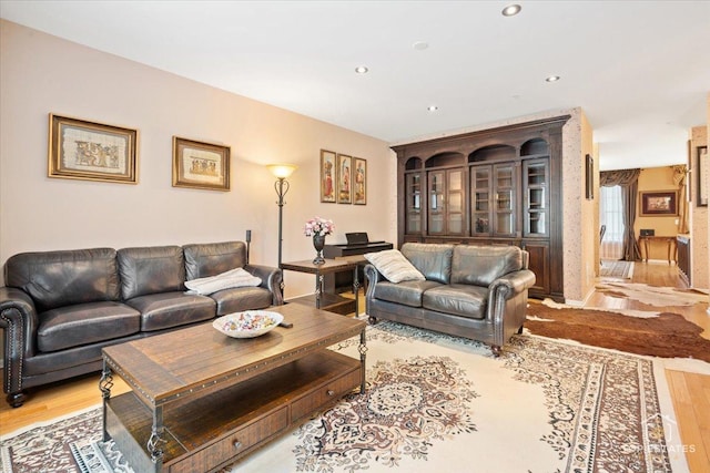 living room with light hardwood / wood-style floors