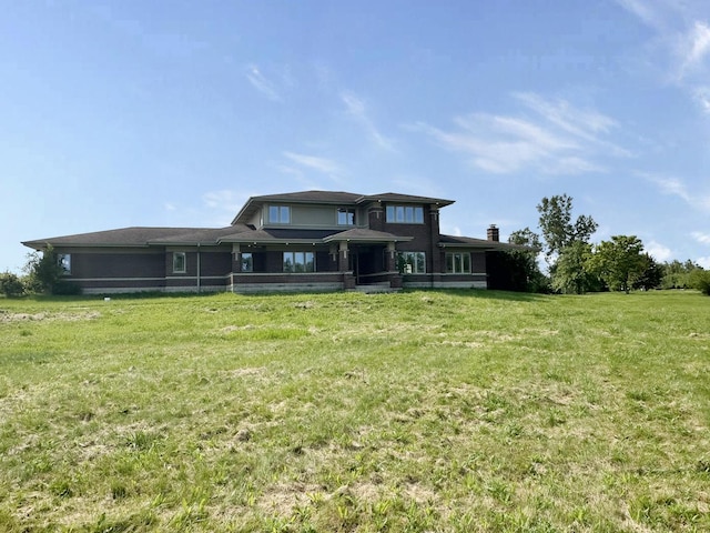 view of front of property with a front lawn