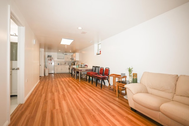 living room featuring light hardwood / wood-style floors