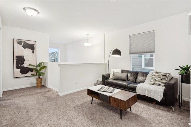 living room featuring light carpet