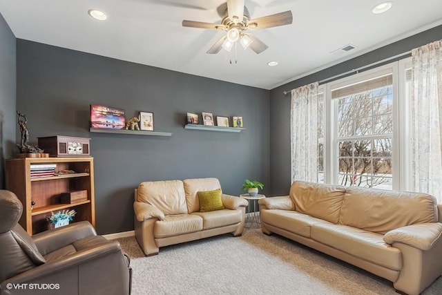 living room featuring visible vents, baseboards, carpet, recessed lighting, and a ceiling fan