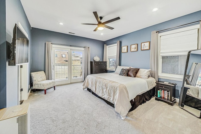 carpeted bedroom featuring ceiling fan and access to outside