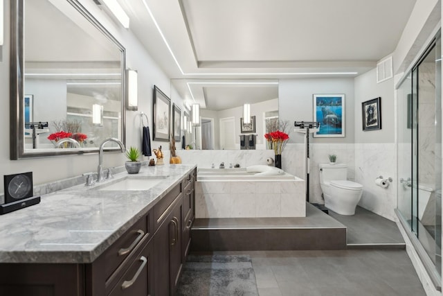 full bathroom featuring tile patterned floors, vanity, toilet, and plus walk in shower