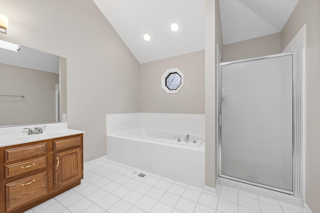 bathroom featuring tile patterned flooring, vanity, independent shower and bath, and lofted ceiling