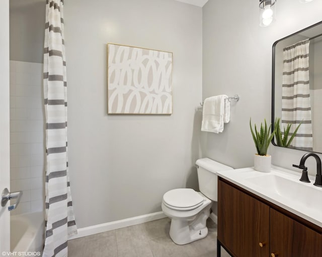 full bathroom featuring tile patterned flooring, vanity, toilet, and shower / bath combo with shower curtain