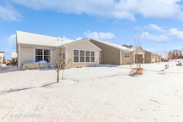 view of snow covered property