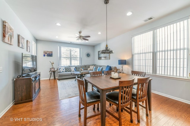 dining room featuring hardwood / wood-style flooring and ceiling fan