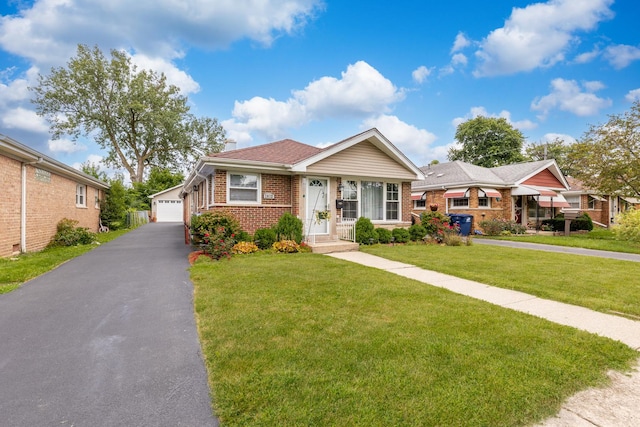 view of front facade with a garage and a front yard