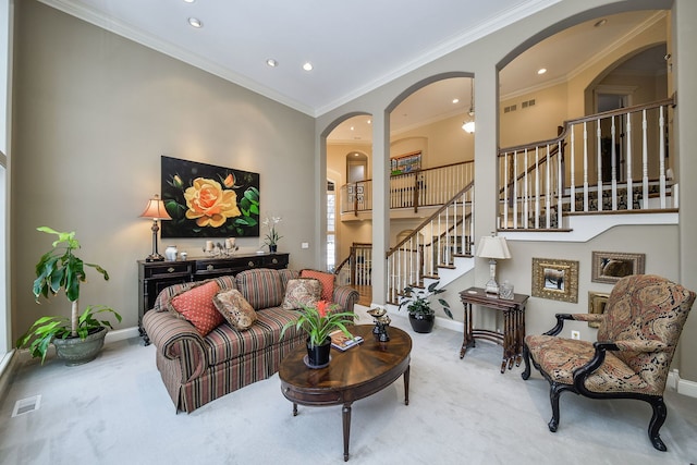 carpeted living room with crown molding