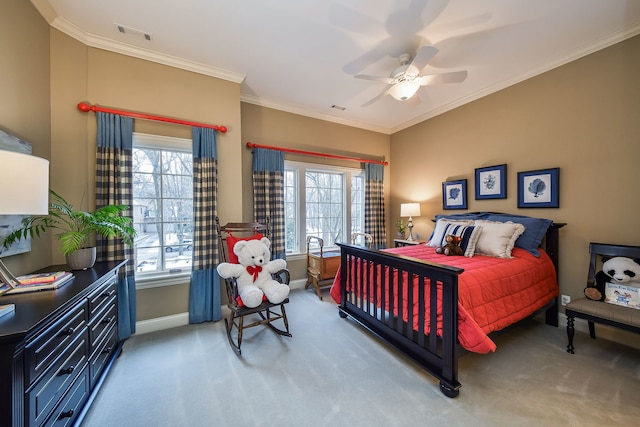 bedroom featuring ornamental molding, carpet flooring, and ceiling fan