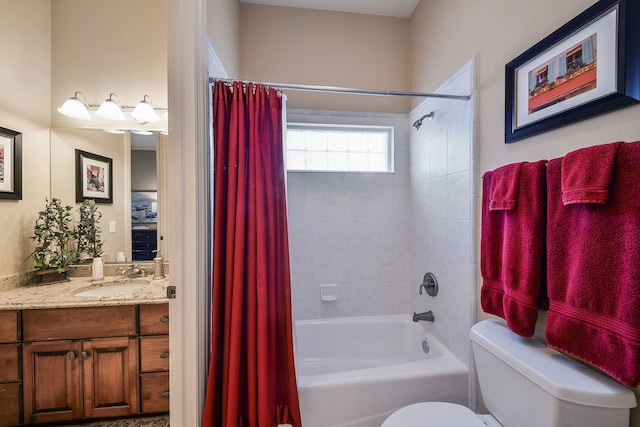 full bathroom featuring shower / bath combination with curtain, vanity, and toilet