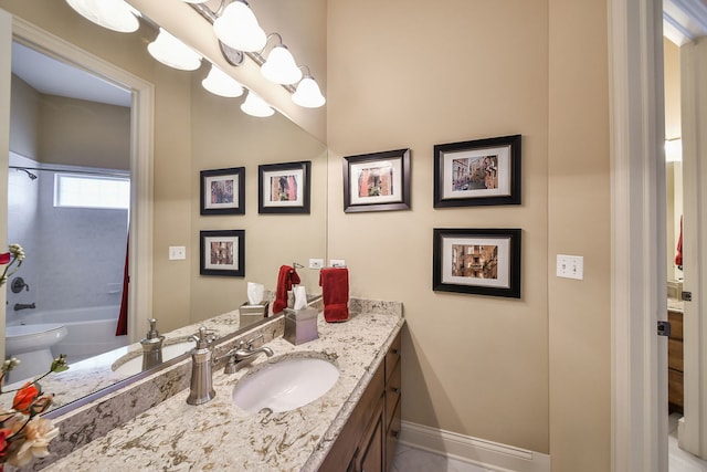 bathroom featuring vanity and bathtub / shower combination