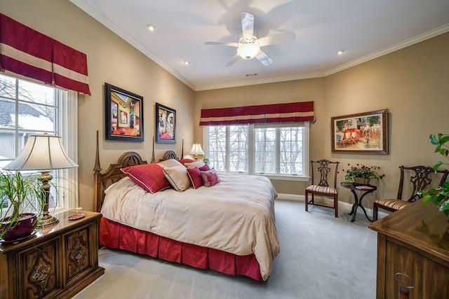 bedroom with ornamental molding, light colored carpet, and ceiling fan