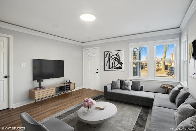 living room with dark wood-type flooring and ornamental molding