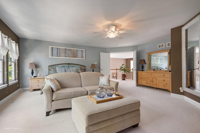 carpeted bedroom with ceiling fan