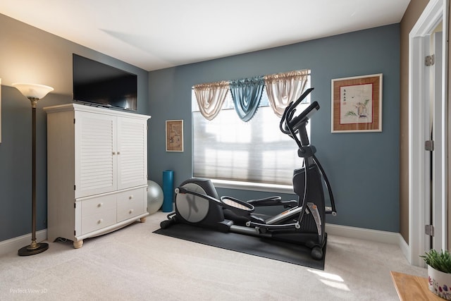 exercise area with light colored carpet