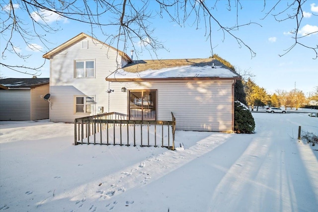 view of snow covered property