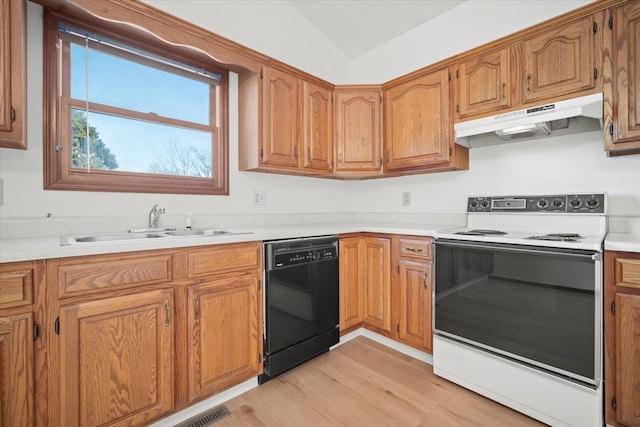 kitchen with white range with electric cooktop, vaulted ceiling, light wood-type flooring, sink, and black dishwasher