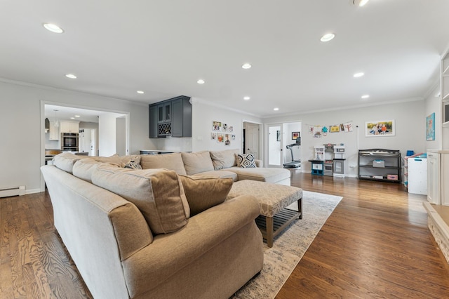 living room featuring a baseboard radiator, ornamental molding, and dark hardwood / wood-style flooring