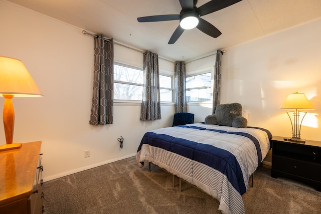 bedroom featuring carpet, baseboards, and a ceiling fan