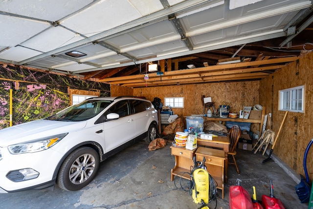 garage featuring a garage door opener