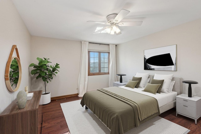 bedroom featuring dark hardwood / wood-style floors and ceiling fan