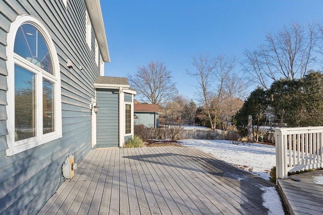 view of snow covered deck