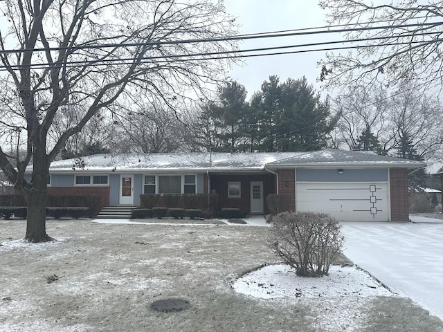 single story home featuring a garage