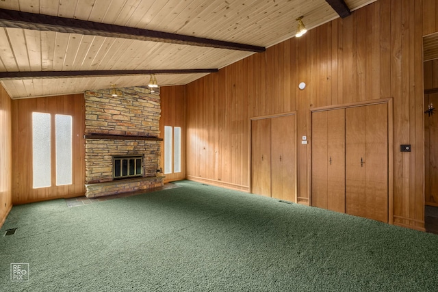 unfurnished living room with a stone fireplace, carpet flooring, wooden ceiling, wooden walls, and lofted ceiling with beams