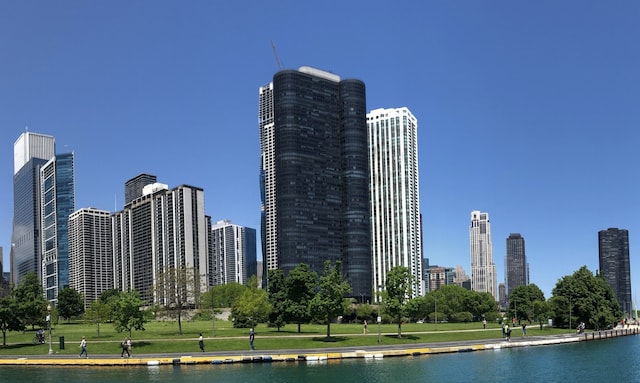 property's view of city with a water view