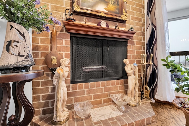 details featuring a fireplace and hardwood / wood-style floors