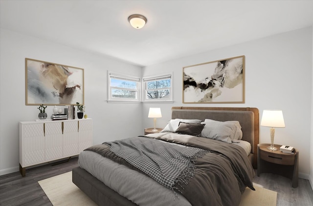 bedroom featuring dark wood-type flooring