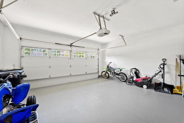 garage featuring a garage door opener