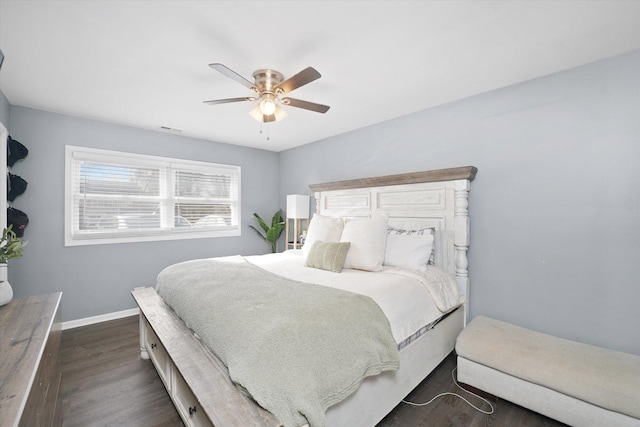 bedroom featuring dark hardwood / wood-style flooring and ceiling fan